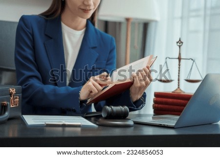 Young business woman lawyer works in office, bookkeeping, audit, stock split, accounting valuation, business combination, marginal deposit, trade account payable, hire purchase, balance sheet account