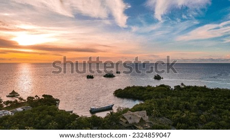 Sunset with the Atlantic sea on the Múcura island in the San Bernardo archipelago near Islas del Rosario Cartagena, Colombia Royalty-Free Stock Photo #2324859047