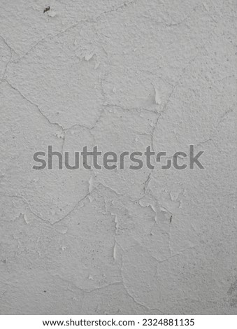 Cracked wall, Paint white peeling off an old interior wall. Cracked flaking white paint background texture.