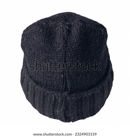 knitted black hat isolated on white background. warm winter accessory