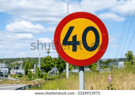 Speed limit 40 kmh by an on ramp.
