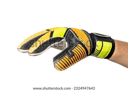 Gloves of the goalkeeper. Goalkeeper gloves highlighted on a white background. The concept of sports equipment and equipment for playing football Royalty-Free Stock Photo #2324947643