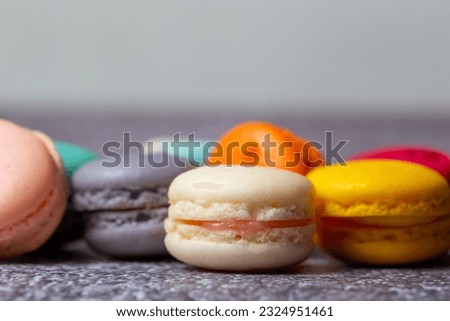 Delicate Confections: Macarons in a Pastel Symphony at a Parisian Patisserie