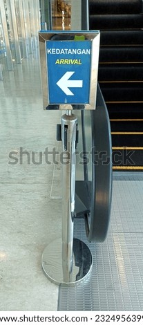 This is a photo of a sign for the arrival of passengers at the airport
