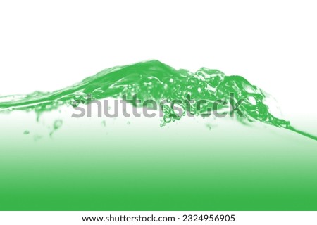 Side view of green water waves and splashes and waves in the isolated background