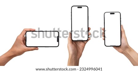 Hand holding the black smart phone with blank screen and modern frameless design in two rotated perspective positions - isolated on white background - Clipping Path Royalty-Free Stock Photo #2324996041