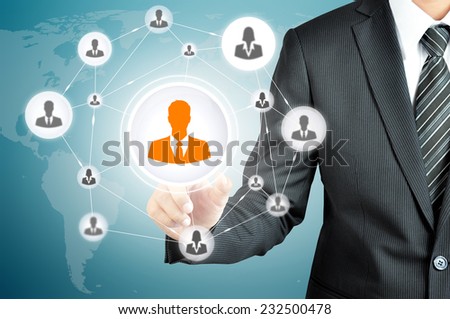 Hand pointing to businessman icon in the middle that linked with each other as network - HR,HRM,MLM, teamwork & leadership concept