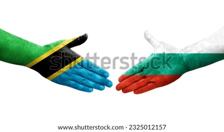 Handshake between Bulgaria and Tanzania flags painted on hands, isolated transparent image.