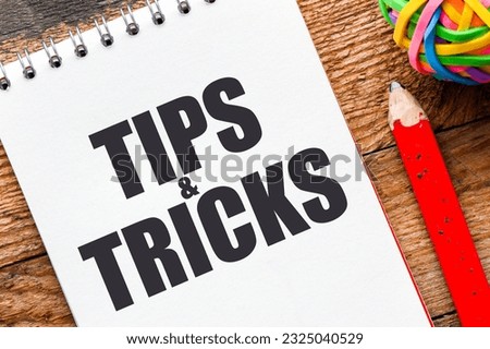 words tips, tricks on notebook Royalty-Free Stock Photo #2325040529
