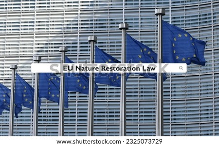 European Union flags with search bar and 'EU Nature Restoration Law' query Royalty-Free Stock Photo #2325073729