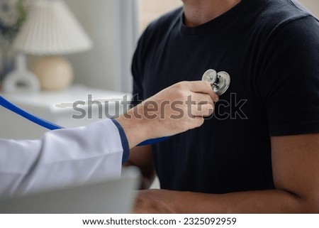 The doctor and the patient are discussing the details of the treatment, the results of the physical examination of the patient. Annual physical examination concept. Royalty-Free Stock Photo #2325092959