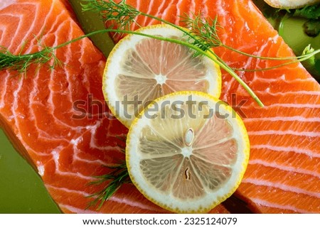 Captivating Top Close-Up of Fresh raw Salmon fish Fillet with Zesty Lemon Slice, in Stunning 4K Resolution
