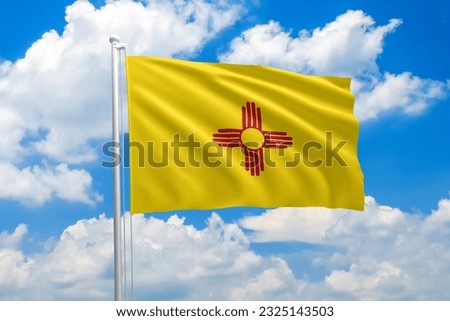 New Mexico flag waving in the wind on clouds sky. High quality fabric. International relations concept