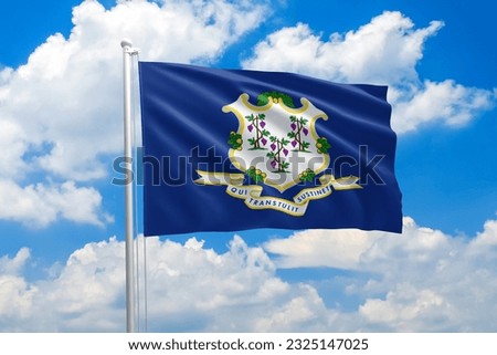 Connecticut flag waving in the wind on clouds sky. High quality fabric. International relations concept