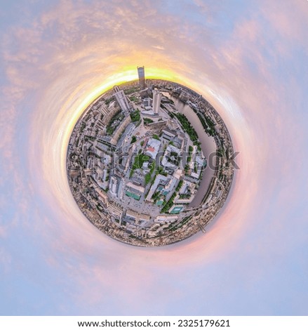 Yekaterinburg city with Buildings of Regional Government and Parliament, Dramatic Theatre, Iset Tower, Yeltsin Center, Aerial summer View. Little planet sphere mode. Evening city in the summer sunset