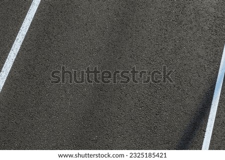 Flat lay composition with asphalt road texture Royalty-Free Stock Photo #2325185421