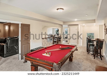 a home game room with a pool table