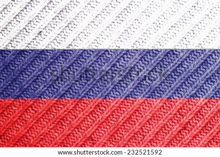 The concept of national flag on woolen background: Russia