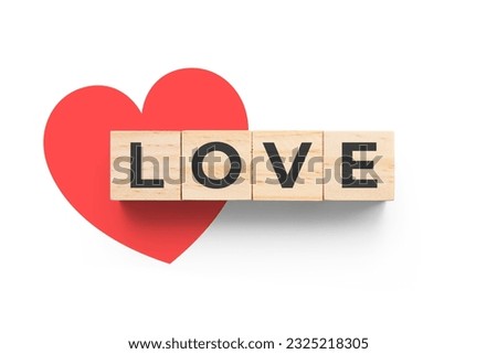 Love wooden cubes on white background with red heart