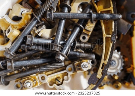 Auto mechanic repair engine Checking a car engine for repair at car garage.Car engine repair. Car service