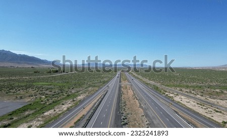 Drone shot of a highway in the desert in Nevada, USA