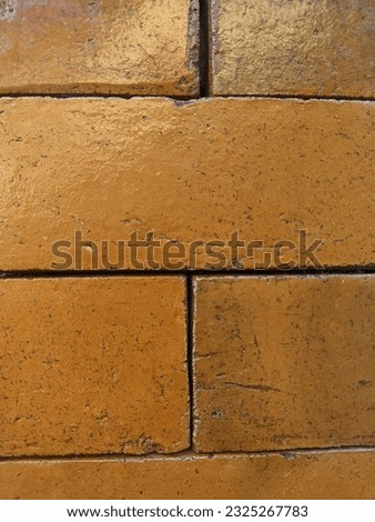 the shape of a neat red brick laying pattern