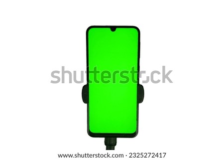 tripod with smartphone vertical position, green screen screen.  isolated white background