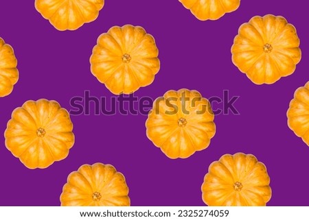 orange pumpkin print top view purple background big size