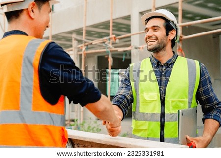 Civil engineers team with safety hard hat working together at construction site outdoor, Construction workers checking and controlling project on building site, Architecture engineering on new project