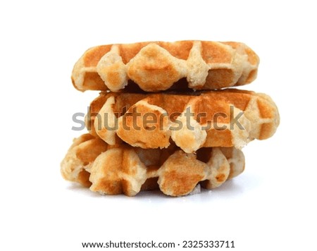 Baked waffles on white background Royalty-Free Stock Photo #2325333711