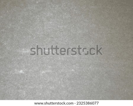 The surface of the gray-blue colored cardboard as a background. High quality photo