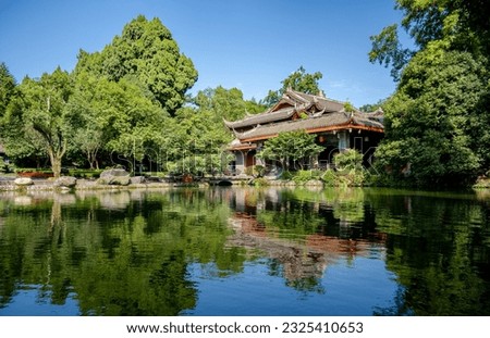 Chinese pavilion,Many Chinese parks and gardens feature pavilions to provide shade and a place to rest. Royalty-Free Stock Photo #2325410653