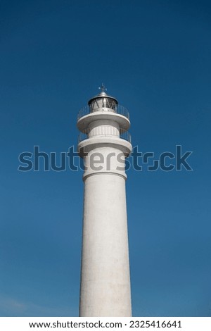 low angle lighthouse with clear sky