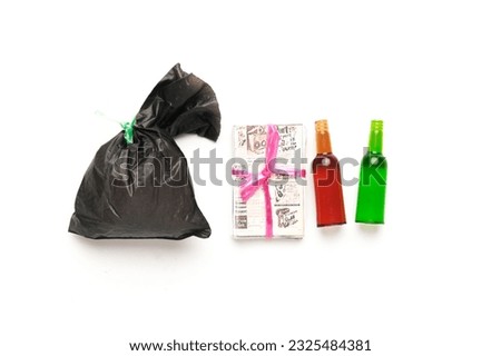 A picture of rubbish miniature on isolated white background. Rubbish and waste management concept
