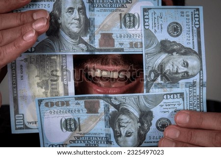 Smile through dollar bills. Smile of a person surrounded by hundred dollar bills. Several hundred dollar bills. Happy person surrounded by dollar bills