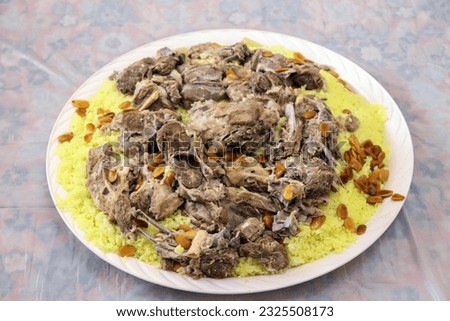 The most famous Arab food for the Jordanian people (Mansaf) is rice, meat and milk Royalty-Free Stock Photo #2325508173