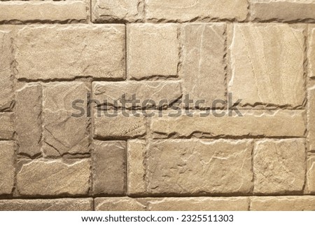 Rectangular stone walls, paving lines, alternating stone materials, wall coverings in interior or exterior applications.