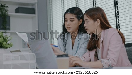 Businesswoman presenting project goal setting strategy at work for colleague in conference room. Event planning for successful business expansion. Serious professional work. white collar worker Royalty-Free Stock Photo #2325518325