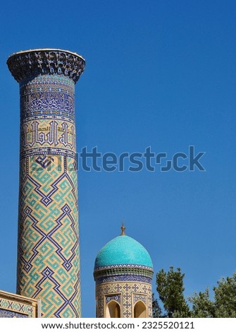 Beautiful minaret and dome in oriental, Islamic style, with original patterns and ornaments.