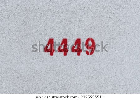 Red Number 4449 on the white wall. Spray paint.
 Royalty-Free Stock Photo #2325535511