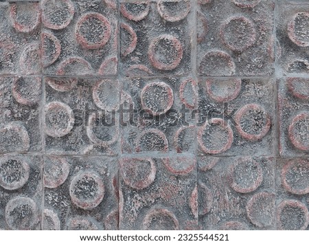 Molded ceramic tiles with abstract and circular pattern, polkadot pattern, 3D printed ceramic tiles with reliefs and contour in natural grey rustic color finish.