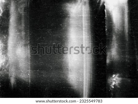 Dusty scratched and scanned old film texture Royalty-Free Stock Photo #2325549783