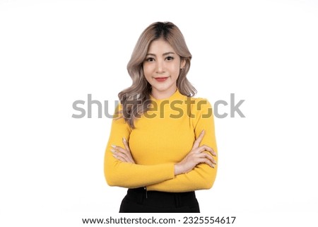Asian happy portrait beautiful cute young woman standing her smile confidence with crossed arms isolated.