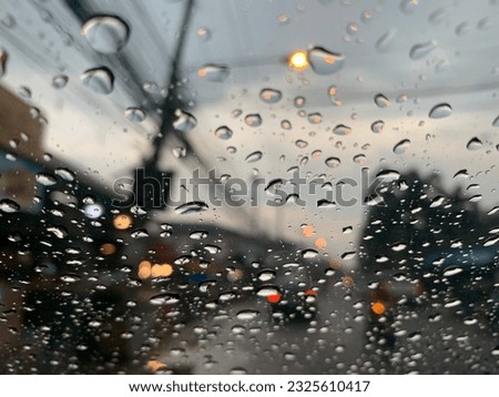 Pictures are not edited through any app. It is an image of raindrops stuck on the windshield of a car after the rain. Bokeh effect. and the light may not be enough