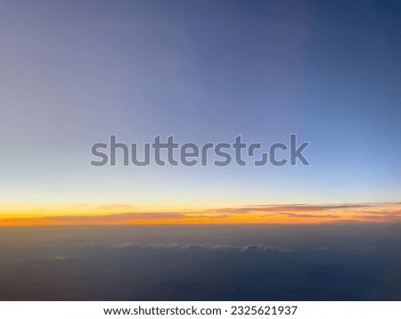 Sunset sky stratosphere background, pictured from plane.