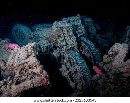 Motobikes or motocycles inside the ship wreck of the SS Thistlegorm in the Red Sea, Egypt.  Underwater photography and travel. Royalty-Free Stock Photo #2325633543