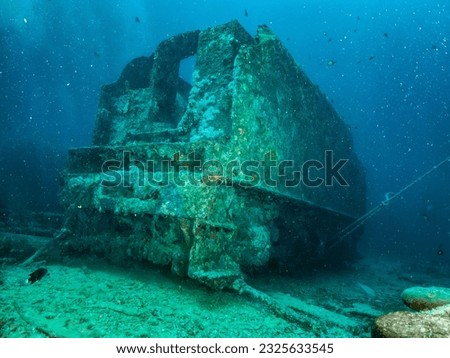 Coal tender on the ship wreck of the SS Thistlegorm in the Red Sea, Egypt.  Underwater photography and travel. Royalty-Free Stock Photo #2325633545