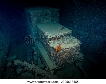 WWII Portable generator inside the ship wreck of the SS Thistlegorm in the Red Sea, Egypt.  Underwater photography and travel. Royalty-Free Stock Photo #2325633565