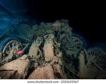 Motobikes or motocycles inside the ship wreck of the SS Thistlegorm in the Red Sea, Egypt.  Underwater photography and travel. Royalty-Free Stock Photo #2325633567