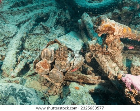 Ammunition inside ship wreck the wreck of the SS Thistlegorm in the Red Sea, Egypt.  Underwater photography and travel. Royalty-Free Stock Photo #2325633577